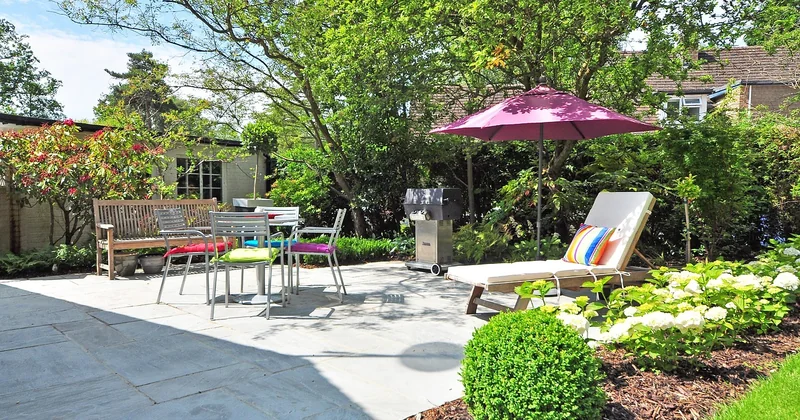 Couler une terrasse contre une maison