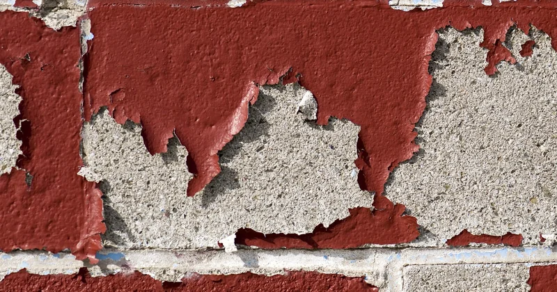 Comment monter des parpaings sur un mur existant